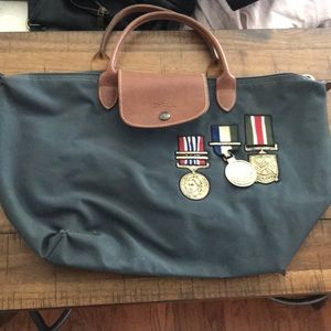 Longchamp medal purse